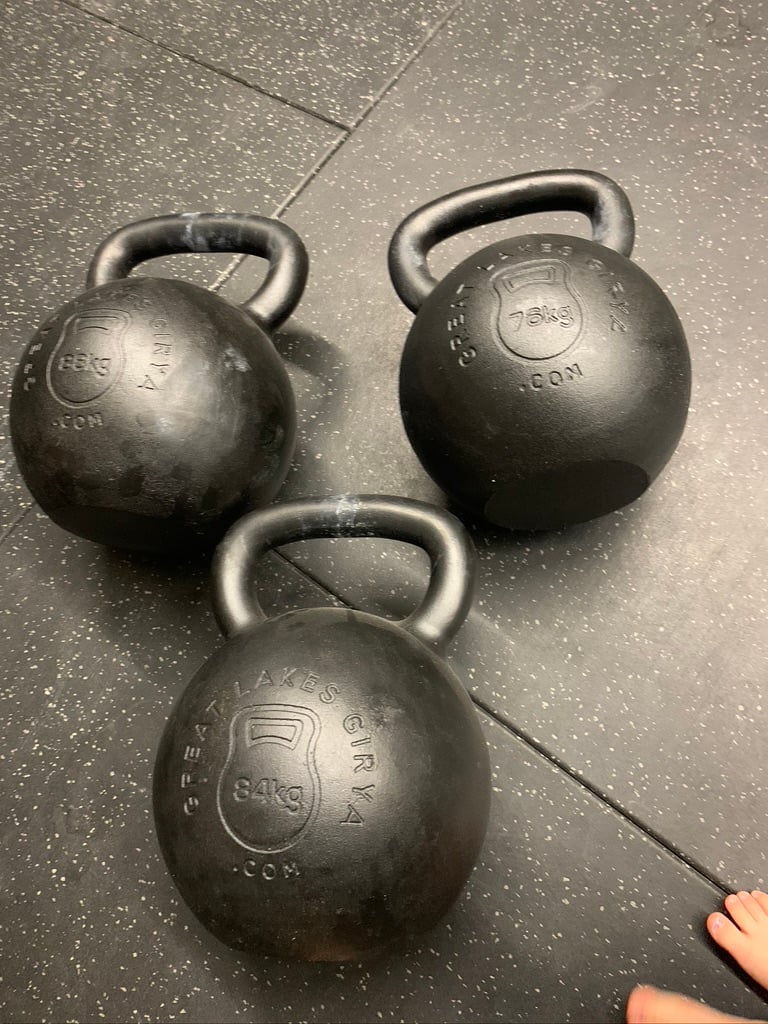three kettlebells