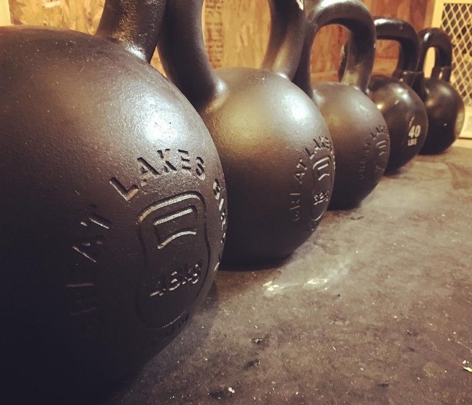 kettlebells in a row